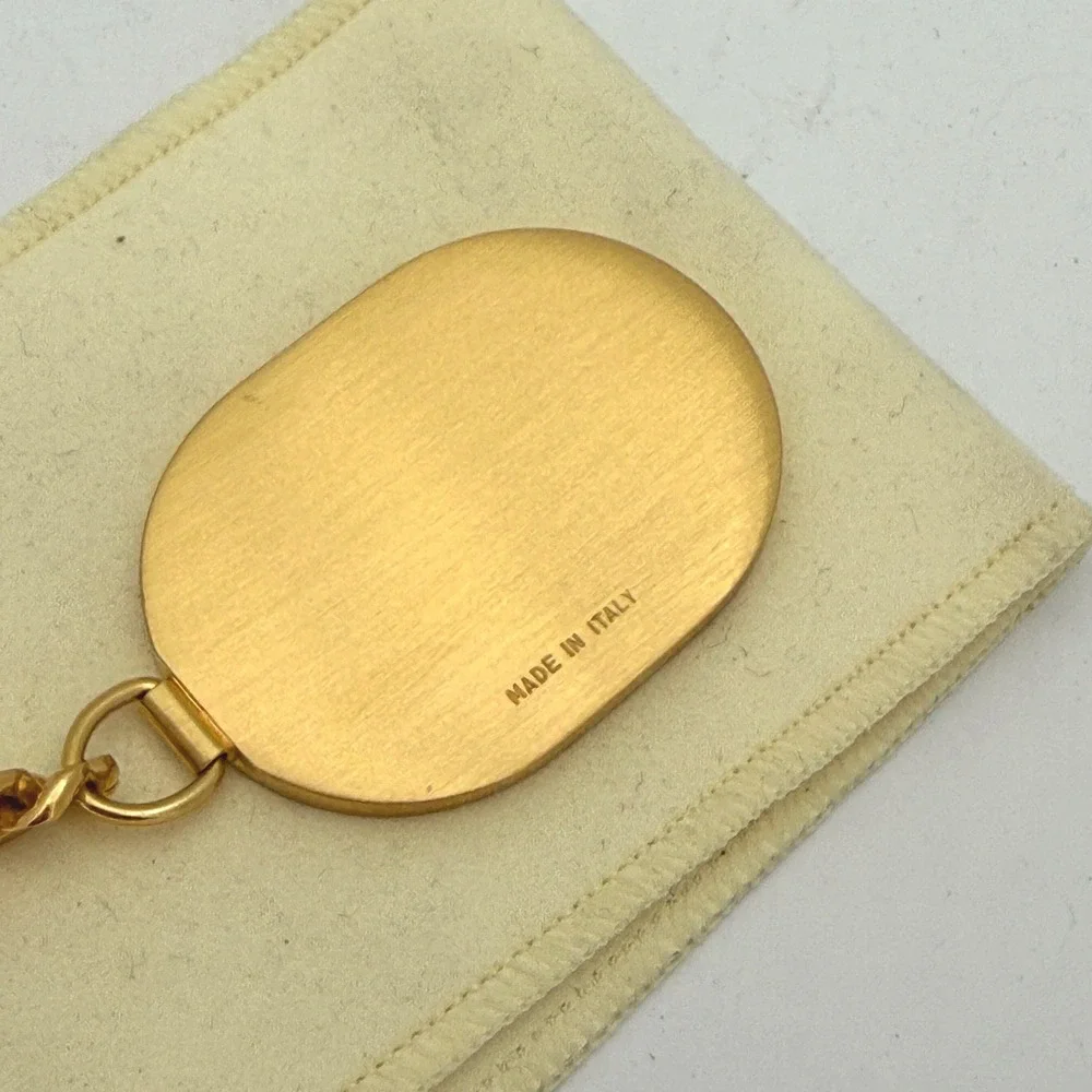 Dunhill Made in Italy Gold-Tone & Black Textured Leather Oval Keychain Key Fob‎